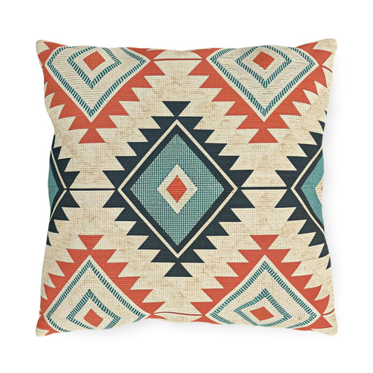 Kilim Diamond outdoor pillow with terracotta, teal and navy diamonds on cream, front view