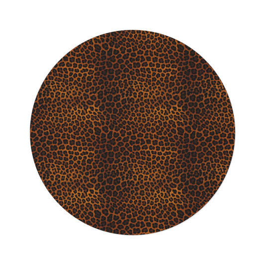 Leopard round rug in warm brown and black leopard print, shown flat