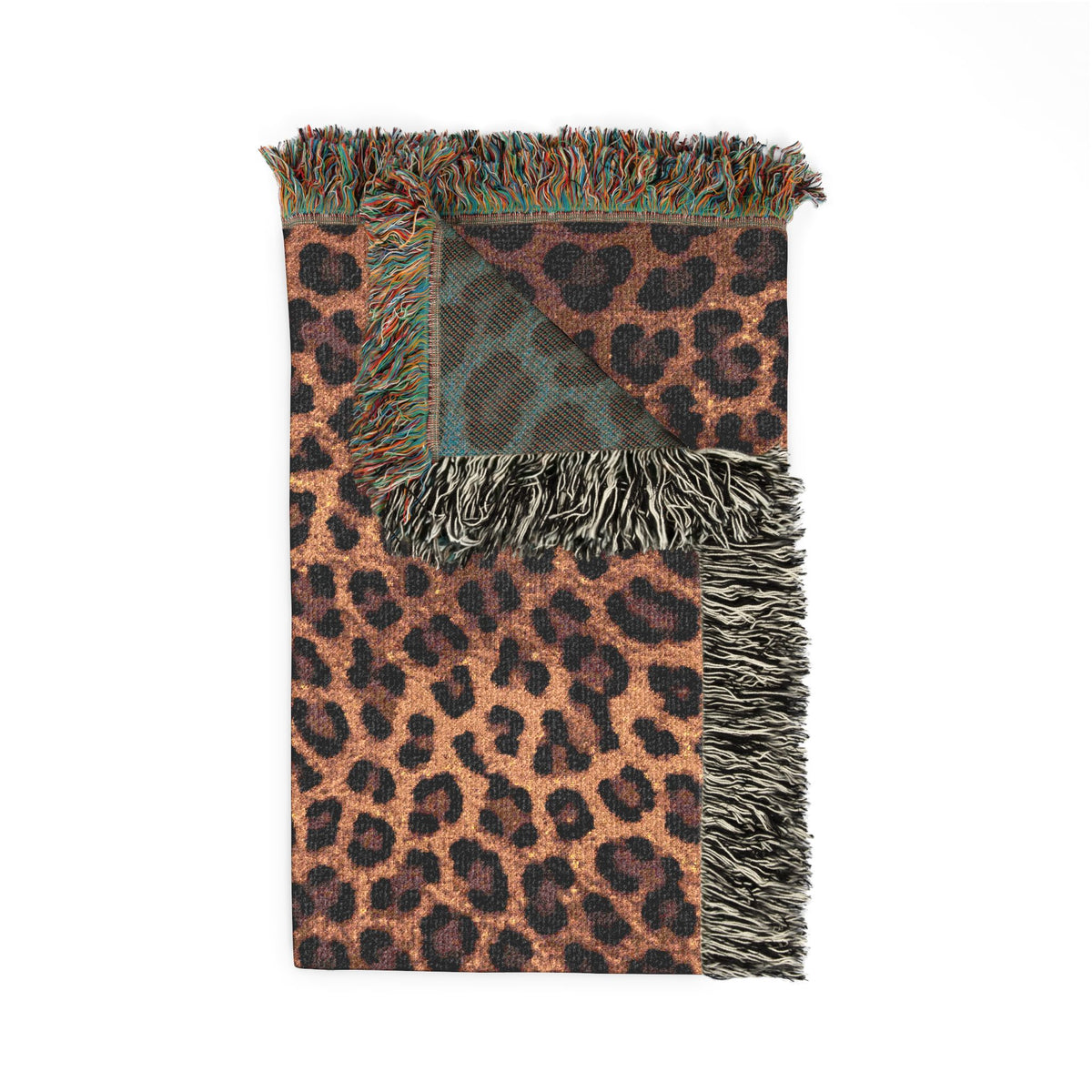 Folded Leopard woven blanket showing the fringed edge and the reverse side