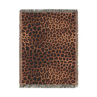 Leopard woven blanket in warm brown and black leopard print, shown flat