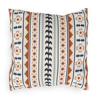 Mexican Boho outdoor pillow in cream with rust, navy and pale blue Aztec stripes, front view