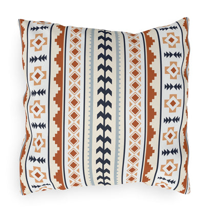 Mexican Boho outdoor pillow in cream with rust, navy and pale blue Aztec stripes, front view