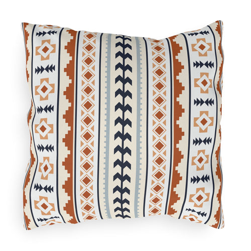 Mexican Boho outdoor pillow in cream with rust, navy and pale blue Aztec stripes, front view