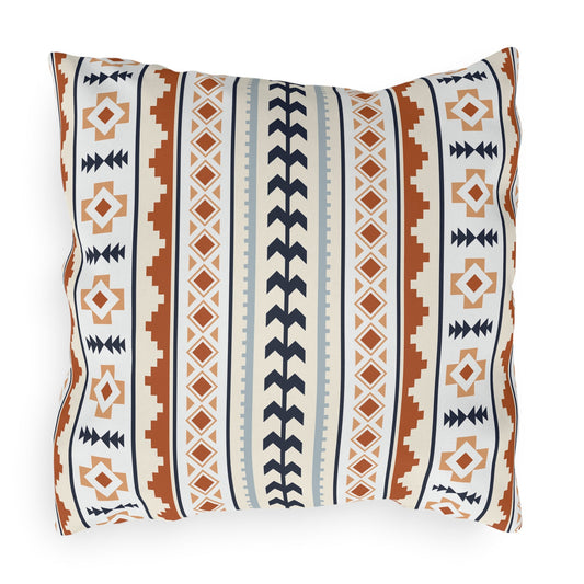 Mexican Boho outdoor pillow in cream with rust, navy and pale blue Aztec stripes, front view