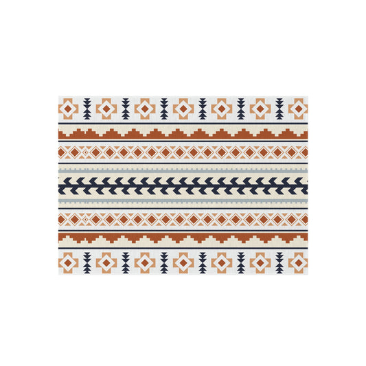 Mexican Boho outdoor rug in cream with rust, navy and pale blue Aztec bands, shown flat