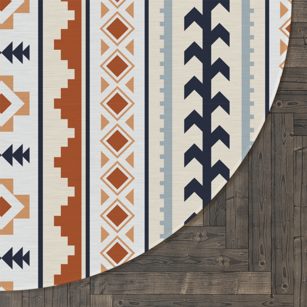 Close-up of the Mexican Boho round rug edge showing the pattern against a dark wood floor
