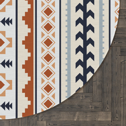 Close-up of the Mexican Boho round rug edge showing the pattern against a dark wood floor