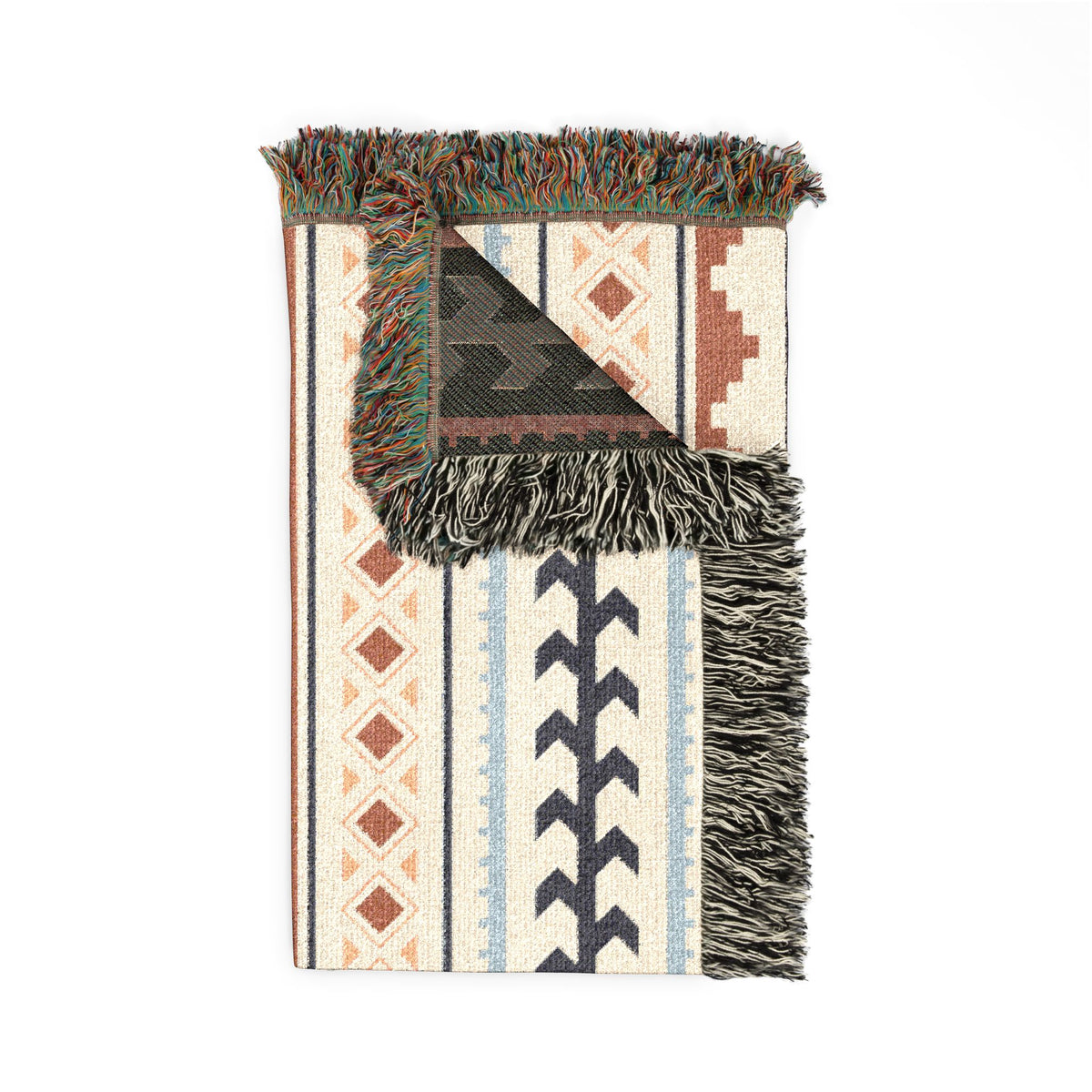 Folded Mexican Boho woven blanket showing the fringed edge and the green reverse side