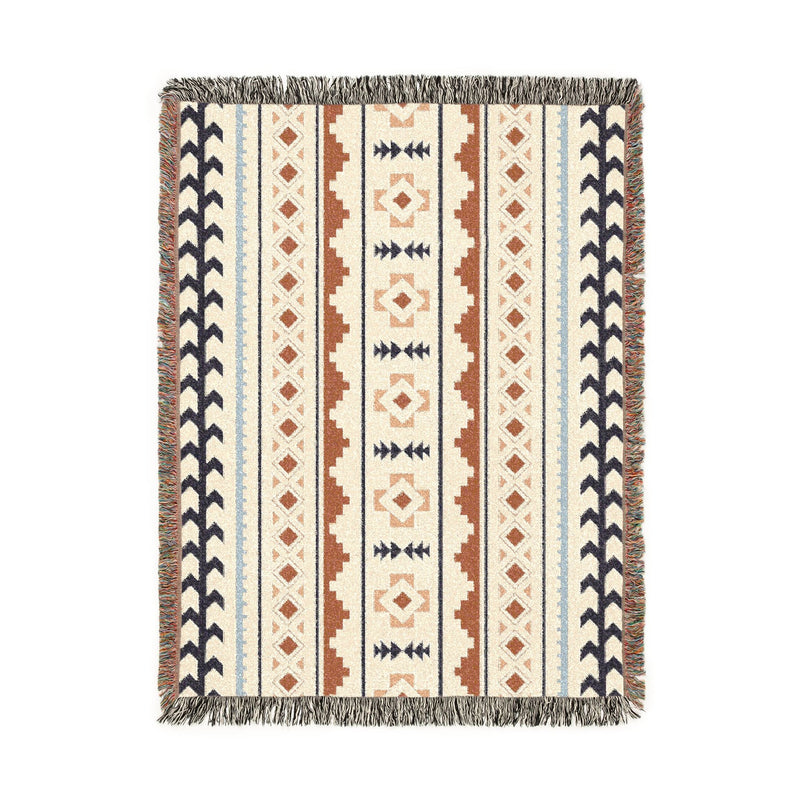 Mexican Boho woven blanket in cream with rust, navy and pale blue Aztec stripes, shown flat