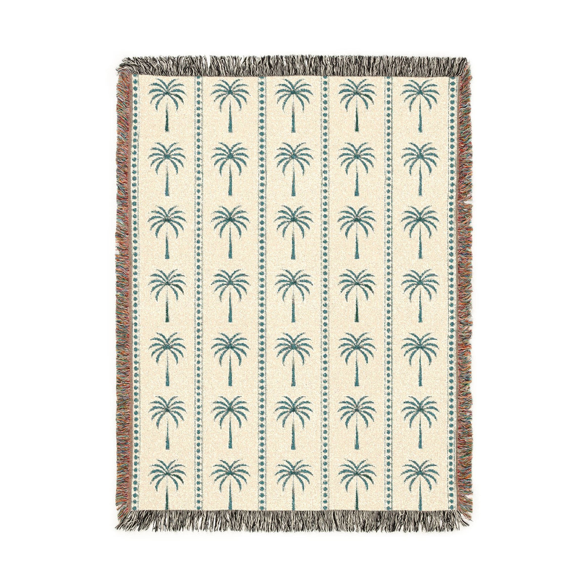 Palm Tree woven blanket in cream with teal and rust palm trees, shown flat