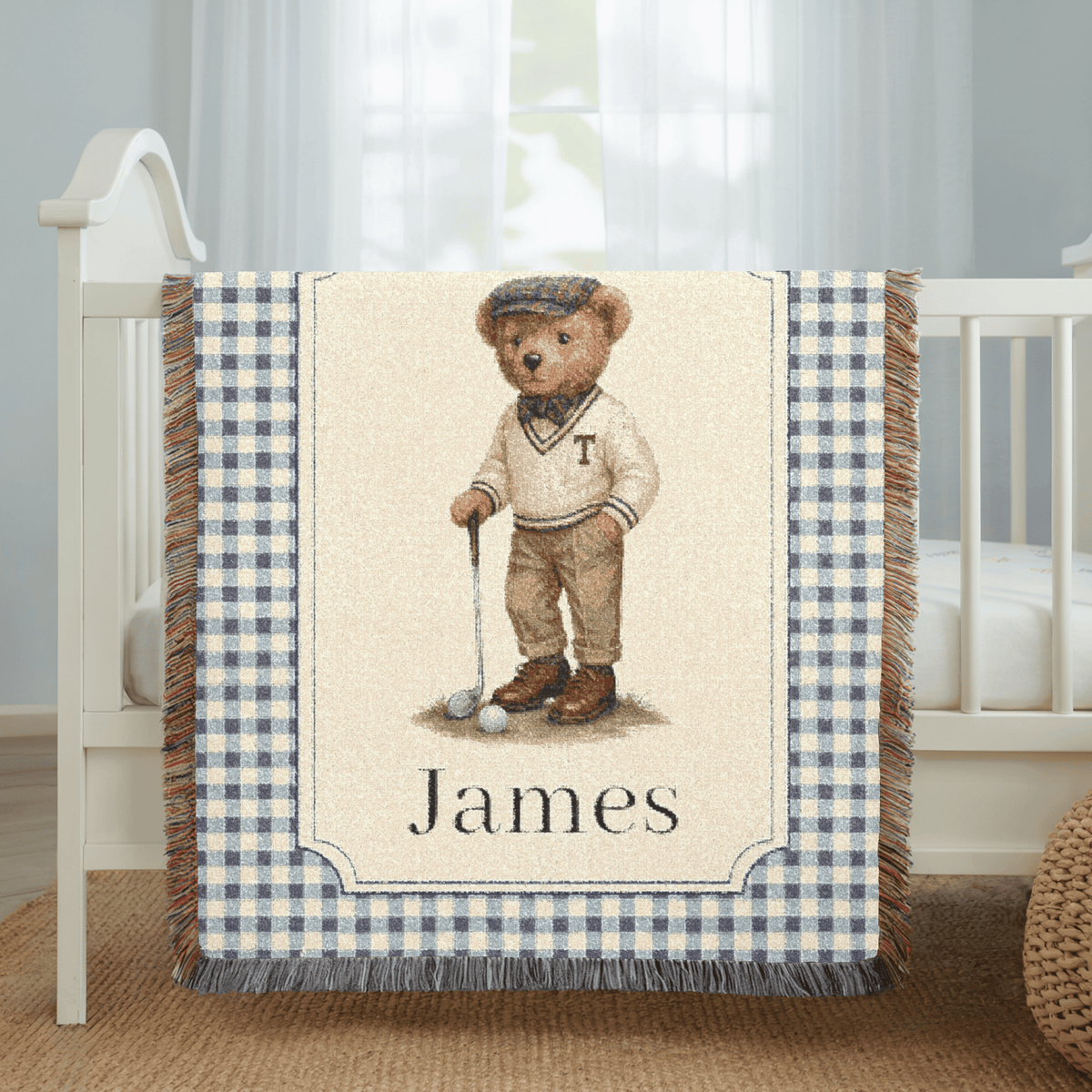 Personalized bear golf baby blanket spread on a bed in a bright bedroom