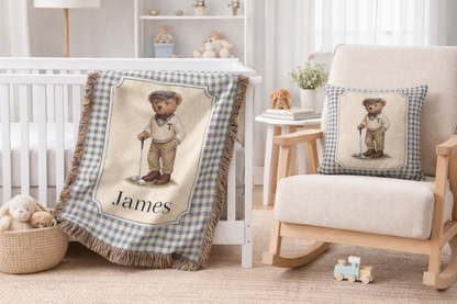 Personalized bear golf baby blanket over an armchair in a light nursery