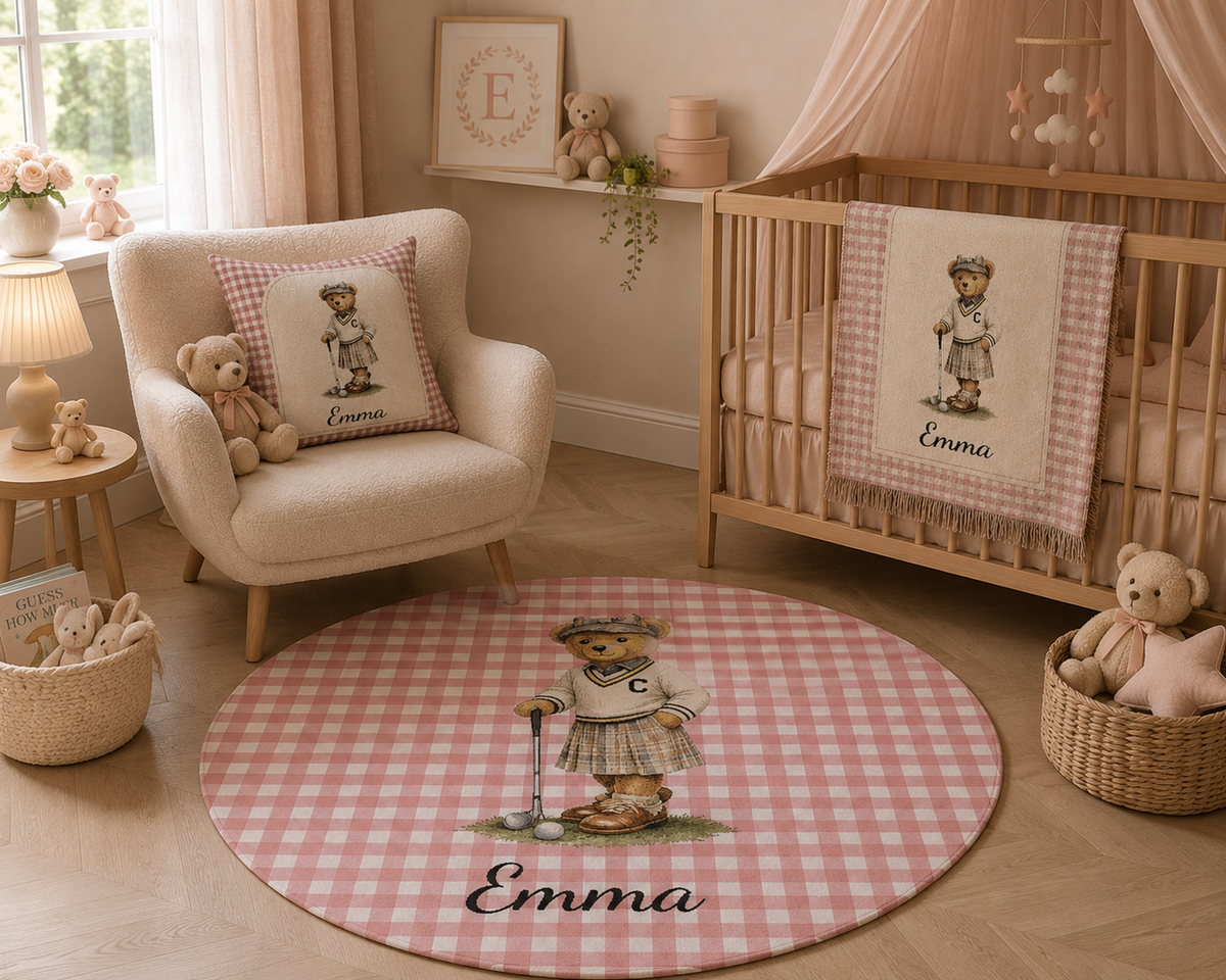 Mother holding the personalized bear golf baby blanket up to the light