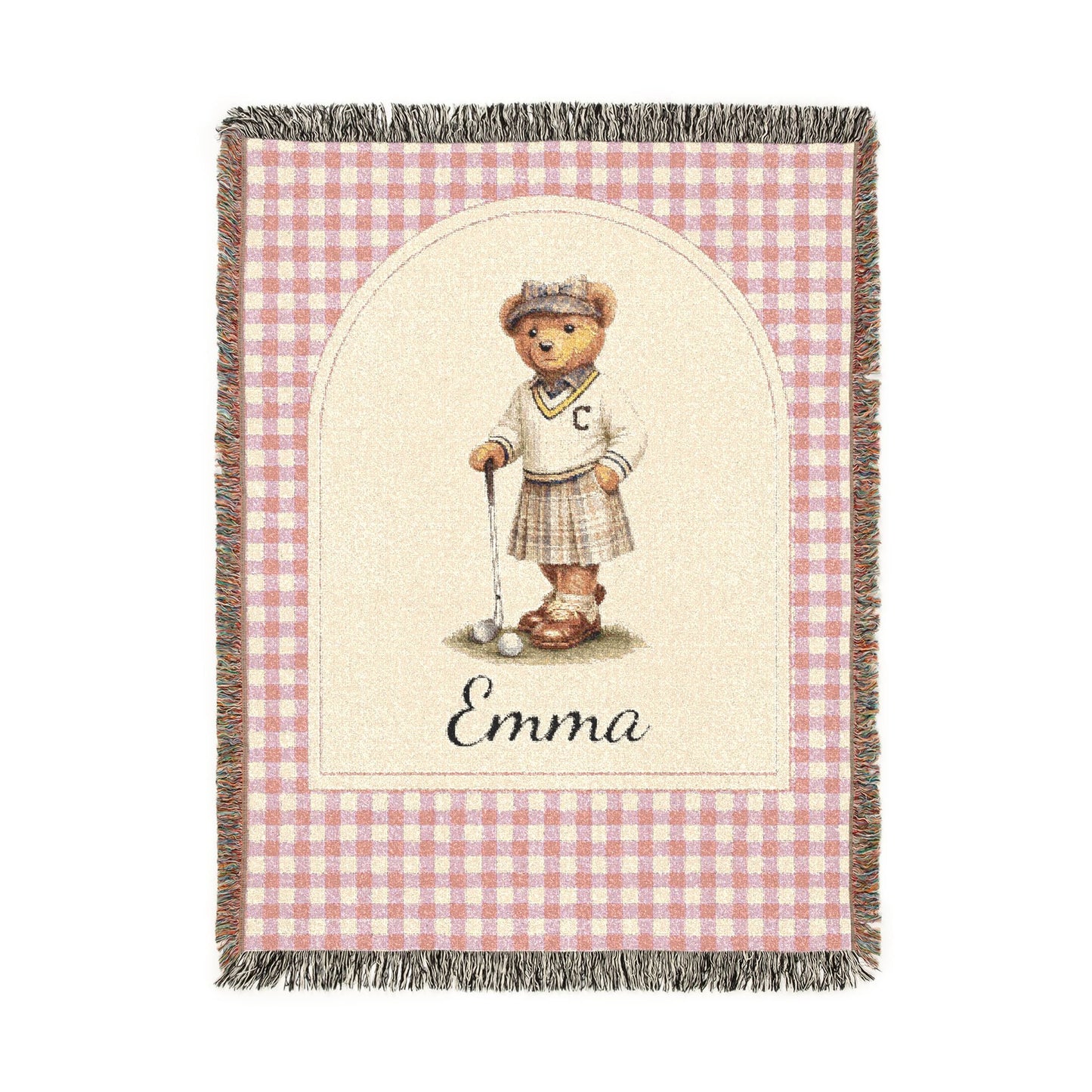 Personalized woven baby blanket with a golfing teddy bear and a name on a pink gingham border, shown flat