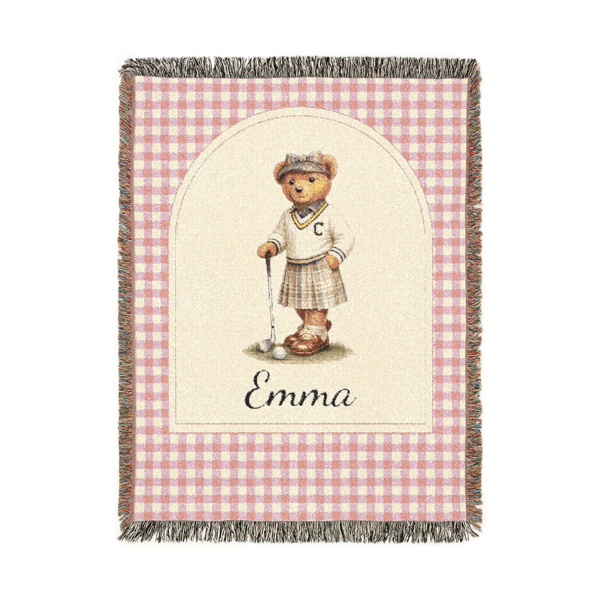 Personalized woven baby blanket with a golfing teddy bear and a name on a pink gingham border, shown flat