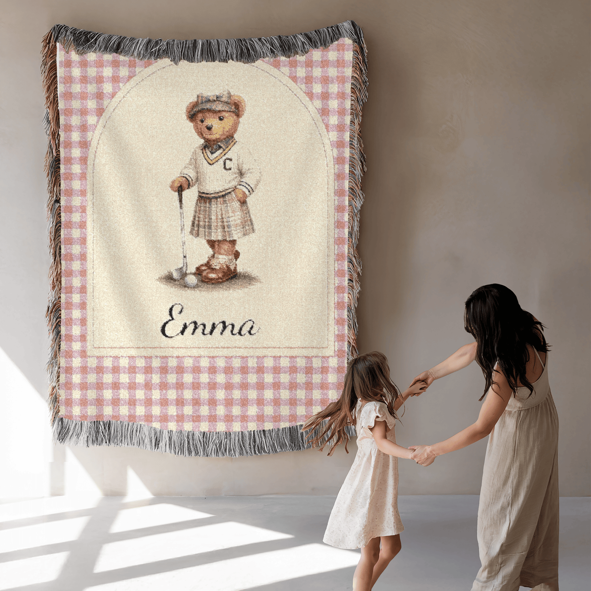 Personalized bear golf baby blanket in a nursery with the matching round rug