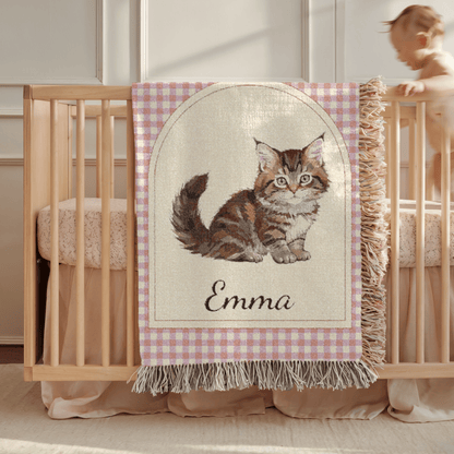 Personalized cat baby blanket with the matching kitten baby pillow in a woven basket