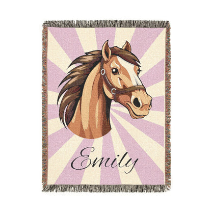 Personalized horse blanket with a chestnut horse on a lilac and cream sunburst, with a name woven in below, shown flat