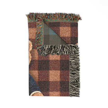 Folded corner detail of the personalized teddy bear plaid woven blanket showing the fringe edge