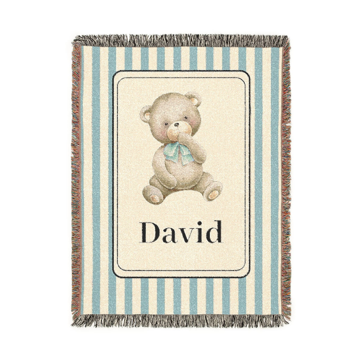 Personalized woven baby blanket with a watercolour teddy bear in a cream panel on a blue and cream stripe, with a name woven in, shown flat