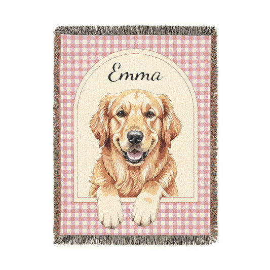 Personalized woven baby blanket with a golden retriever in an arched panel on pink gingham, with a name woven in, shown flat