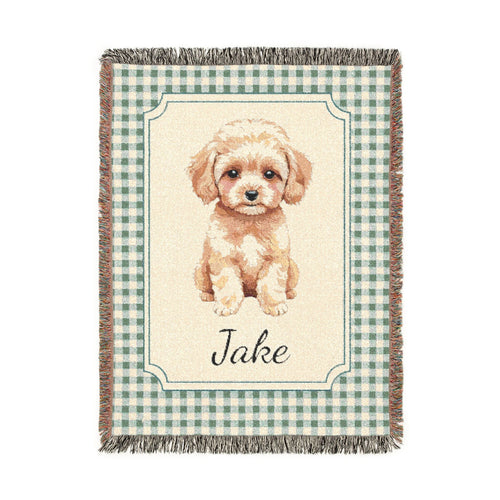 Personalized woven baby blanket with a cream apricot puppy in a framed panel on sage gingham, with a name woven in, shown flat
