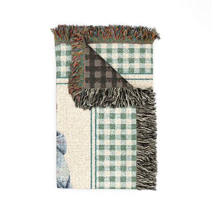 Folded personalized teddy bear baby blanket showing the fringed edge and the dark reverse side