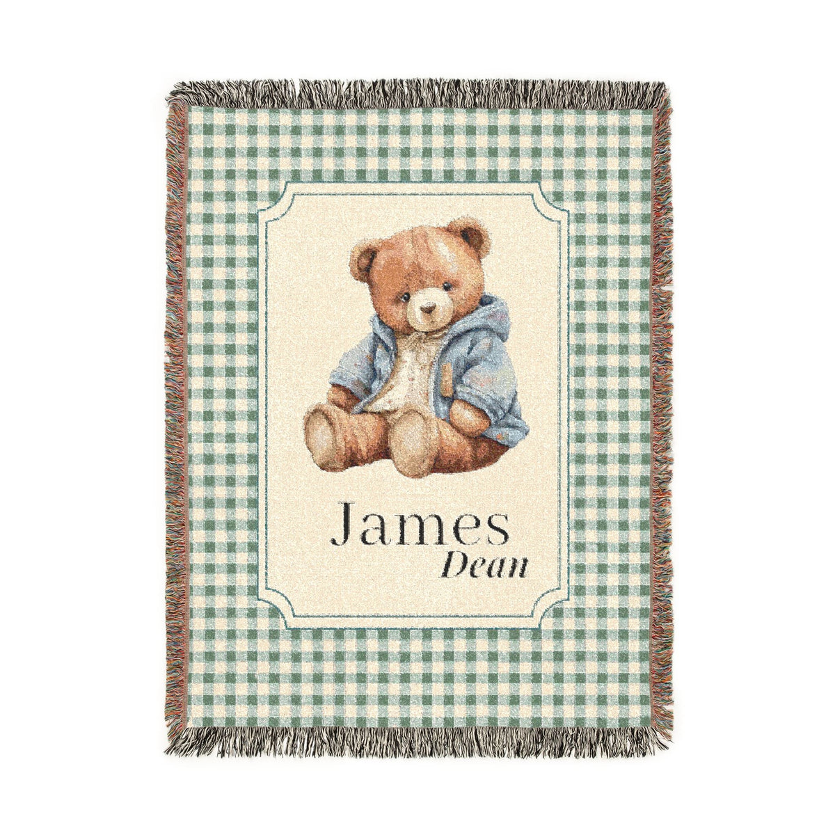 Personalized woven baby blanket with a teddy bear in a blue jacket on sage gingham, with a first and middle name woven in, shown flat