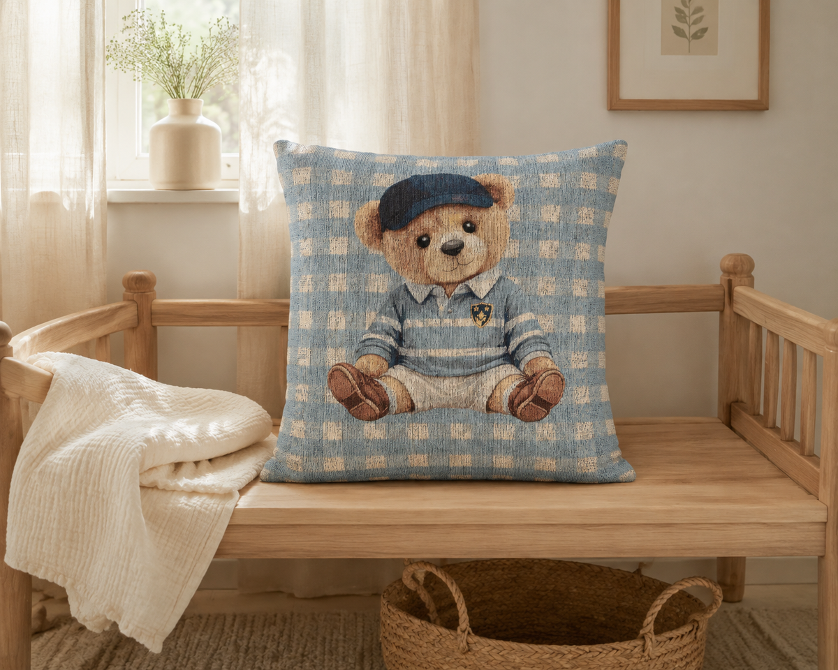 Teddy bear baby pillow on a bench in a nursery with a wooden crib behind