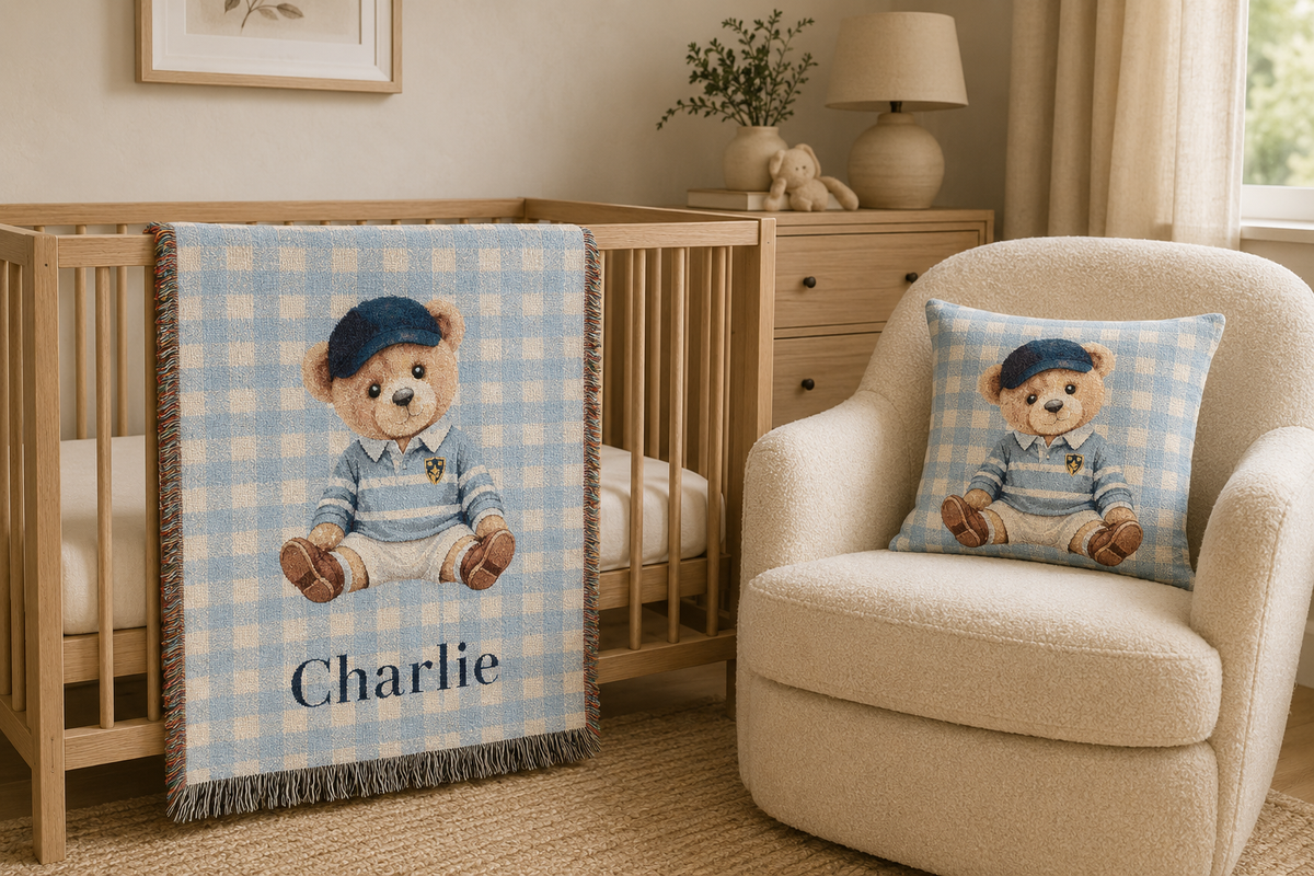 Nursery with the teddy bear baby pillow on an armchair and the matching personalized teddy bear baby blanket on the crib