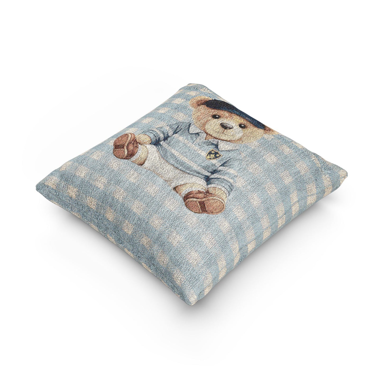 Teddy bear baby pillow shown at an angle to show its depth and seam