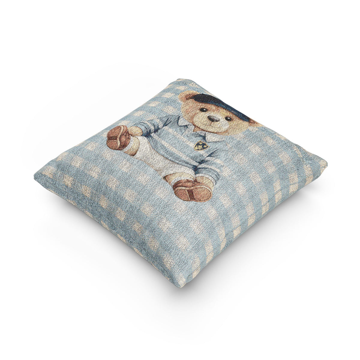 Teddy bear baby pillow shown at an angle to show its depth and seam