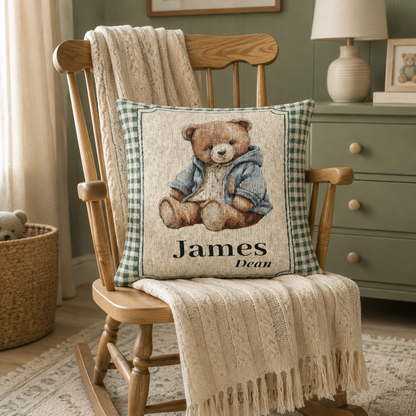 Personalized woven pillow with a teddy bear in a blue jacket on sage gingham with a name woven in