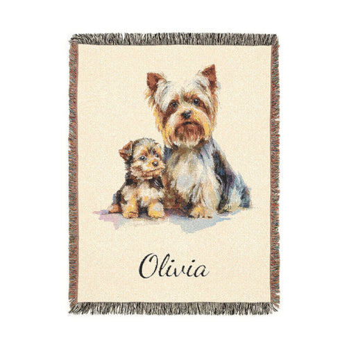 Personalized Yorkshire terrier blanket with a terrier and puppy painted on cream, with a name woven in below, shown flat