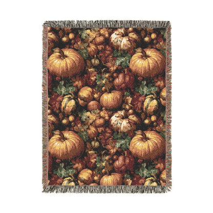 Pumpkin Harvest woven throw blanket with a dense pattern of pumpkins, gourds, acorns and leaves, front view