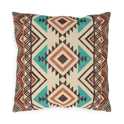Rust and teal Aztec diamond outdoor pillow in cream with turquoise and rust diamonds, front view
