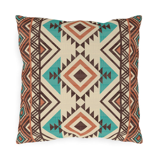 Rust and teal Aztec diamond outdoor pillow in cream with turquoise and rust diamonds, front view