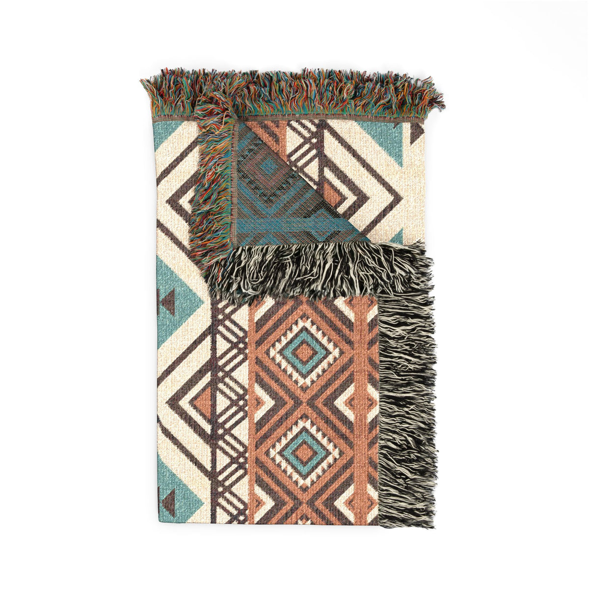 Folded rust and teal Aztec diamond woven blanket showing the fringed edge and the teal reverse side