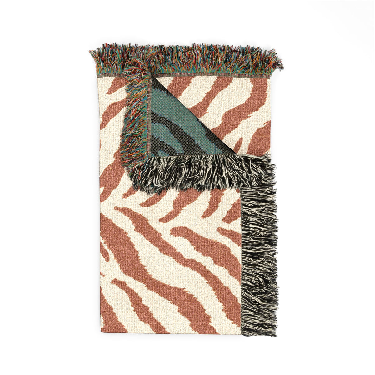 Folded Safari woven blanket showing the fringed edge and the teal reverse side