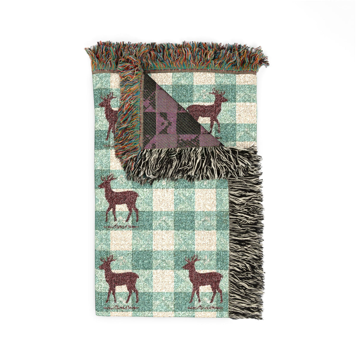 Folded corner detail of the sage gingham deer woven blanket showing the fringe edge