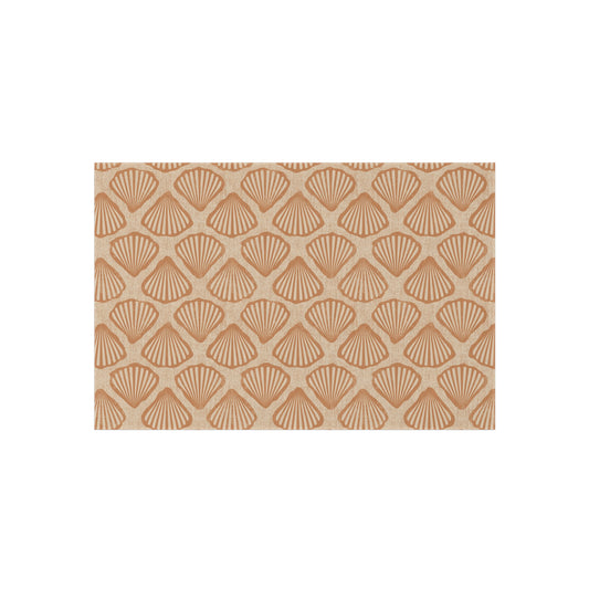 Sea Shell outdoor rug in cream with terracotta scallop shells, shown flat