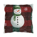 Snowman Plaid outdoor pillow with watercolor snowmen on red and green plaid with snowflakes, front view