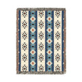 Southwestern woven blanket in cream with navy, blue and rust Aztec stripe bands, shown flat