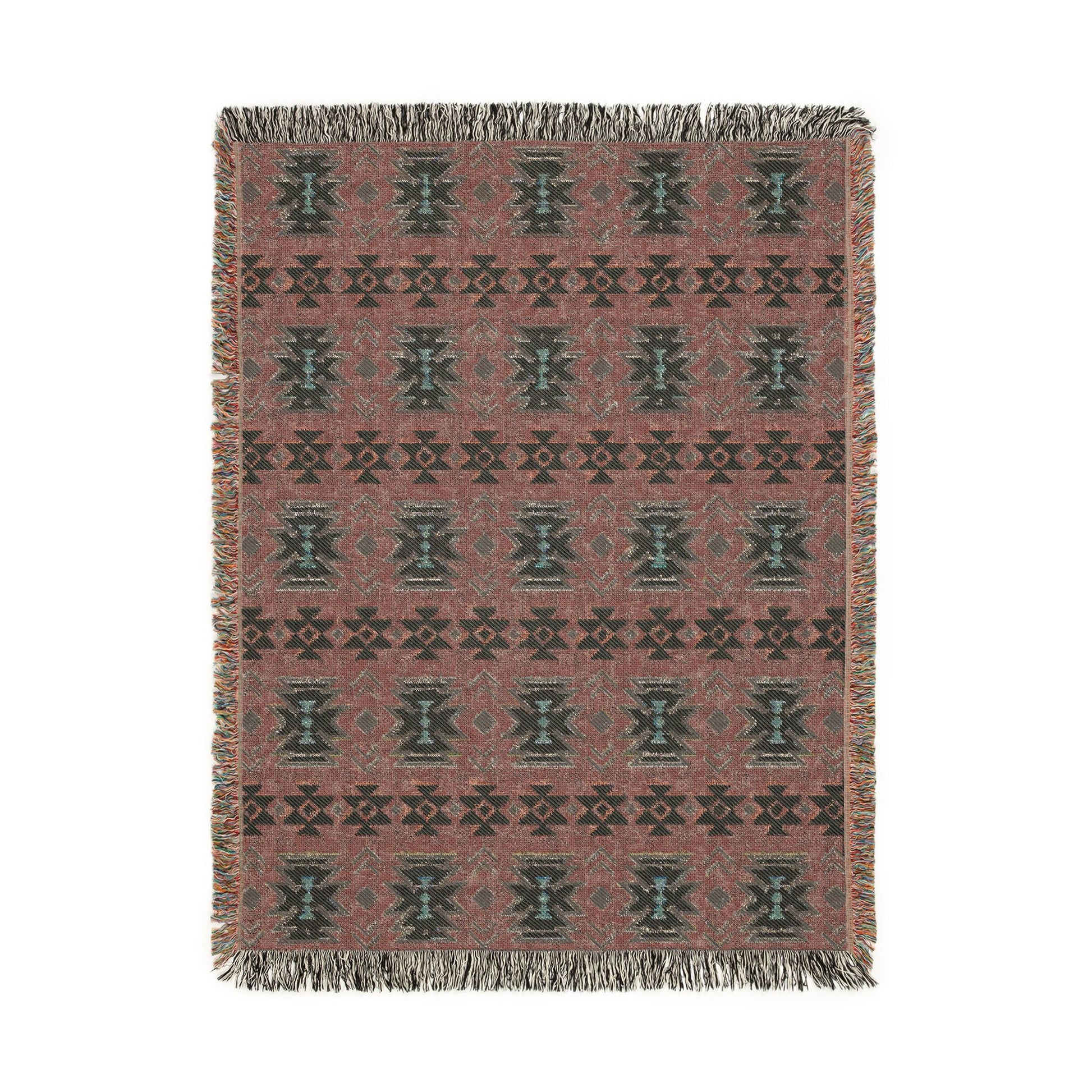 Reverse side of the sky blue Southwestern woven blanket in dusty mauve with teal medallions
