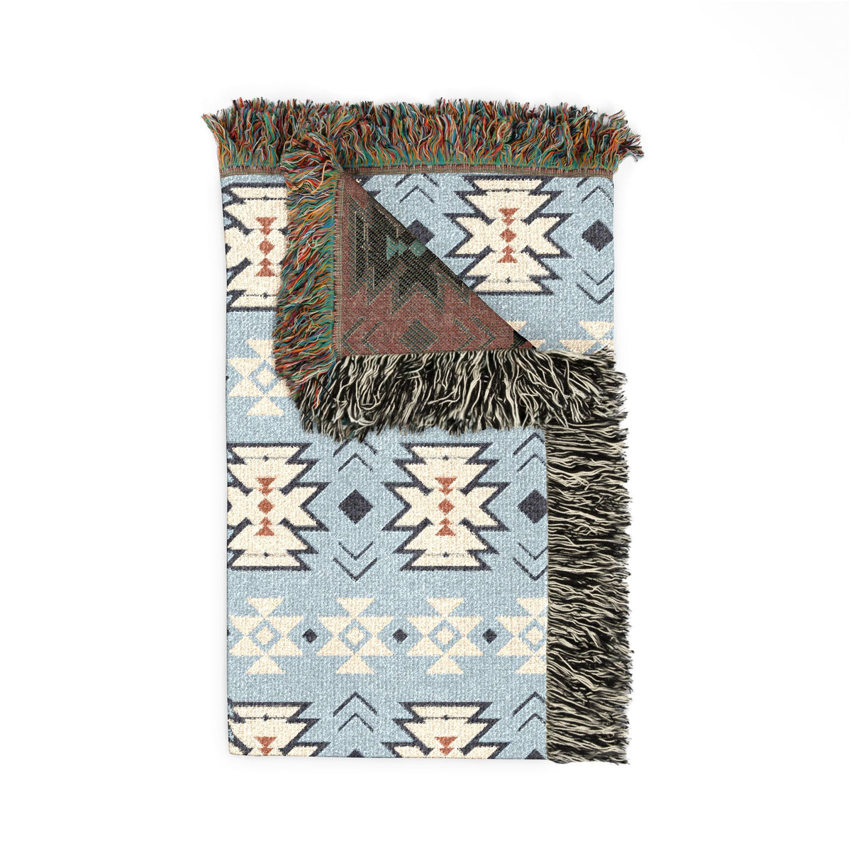 Folded sky blue Southwestern woven blanket showing the fringed edge and the mauve reverse side