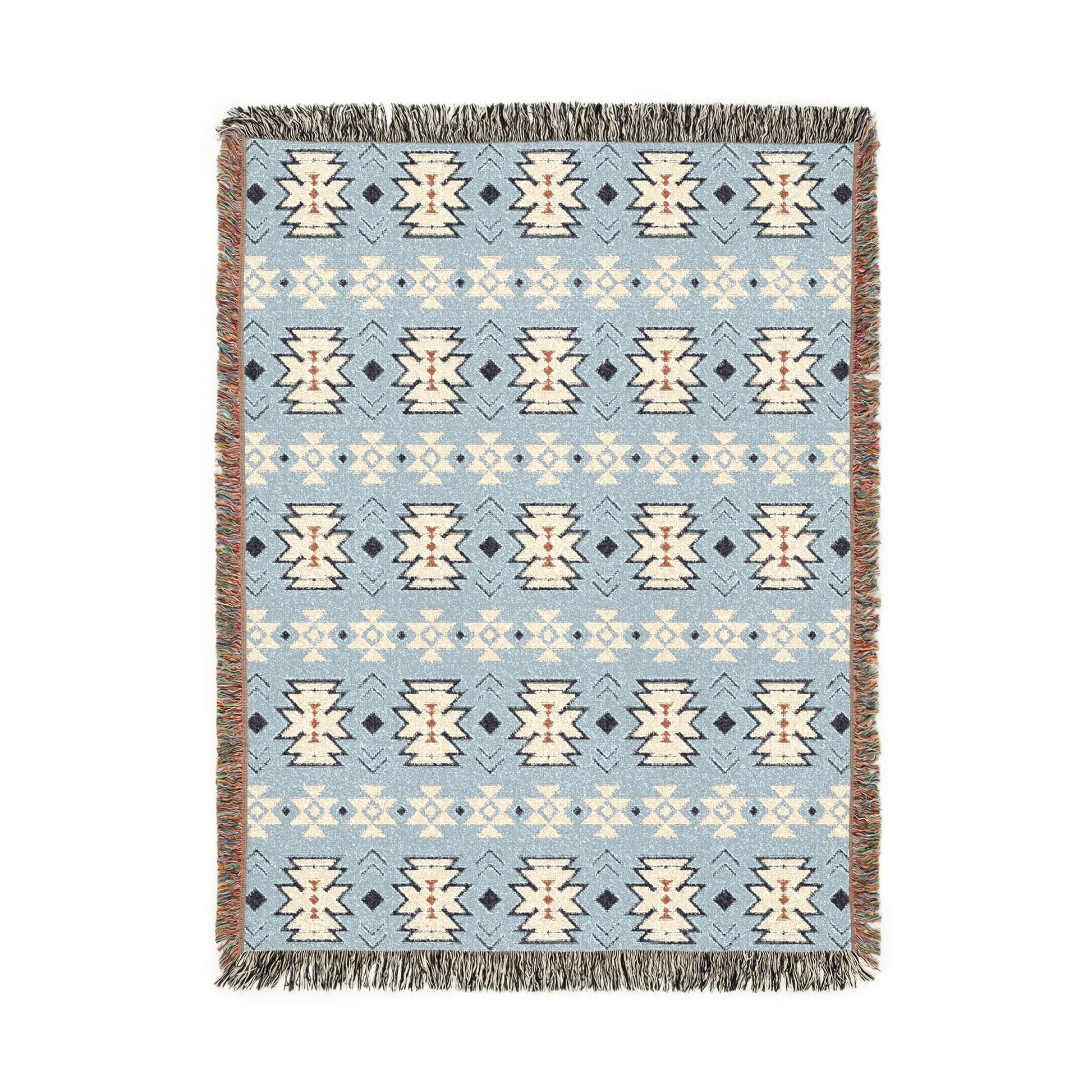 Southwestern woven blanket in pale blue with cream and navy medallion motifs, shown flat