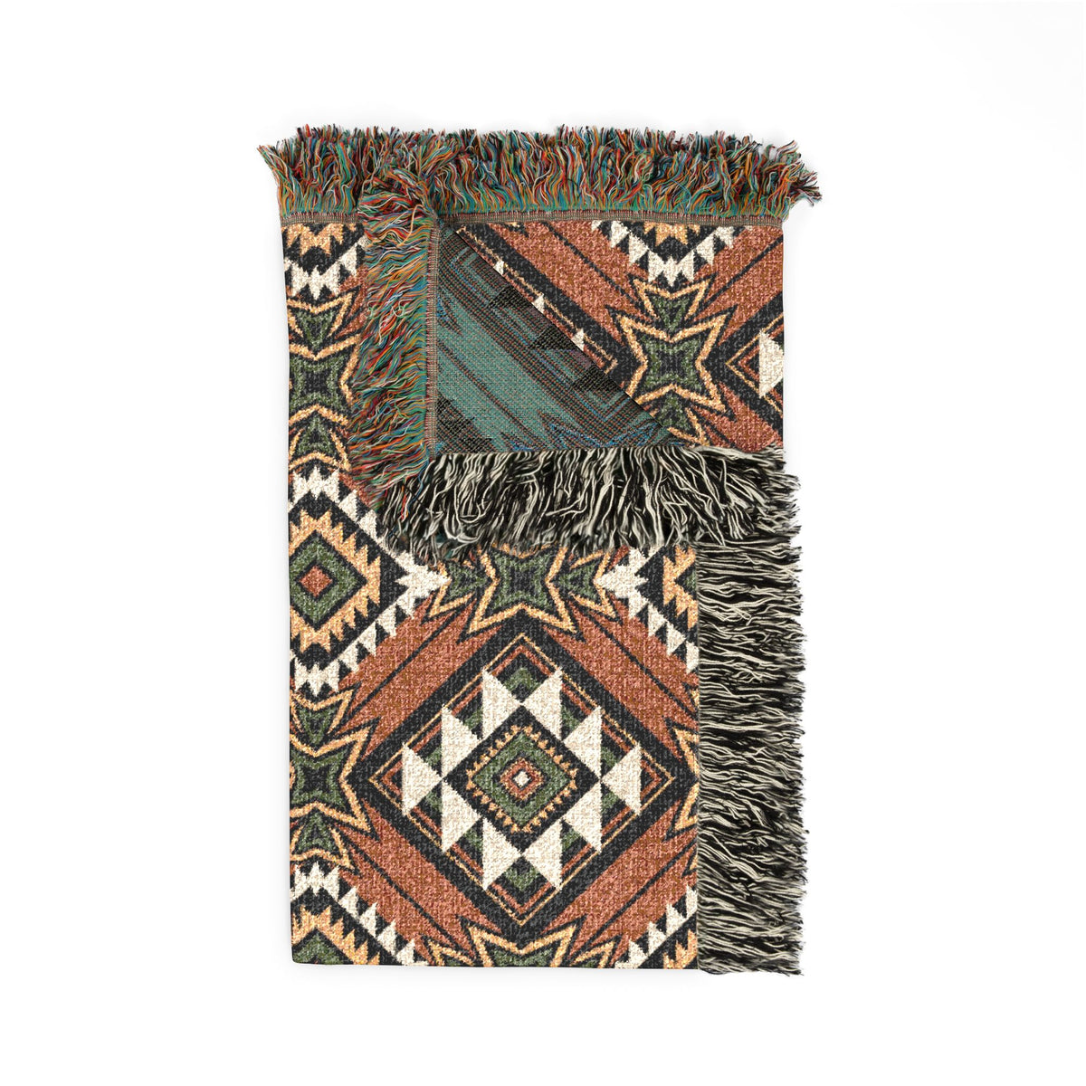 Folded corner detail of the Star Medallion Aztec woven blanket showing the fringe edge