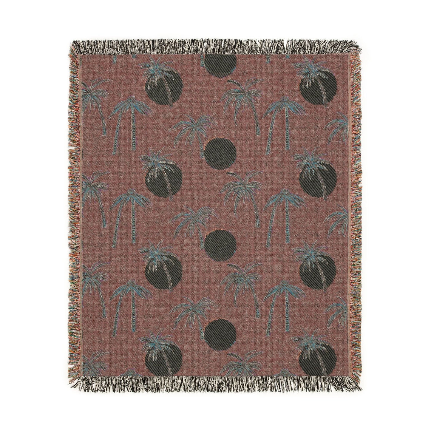 Reverse side of the Summer Palm woven blanket in rust with cream dots
