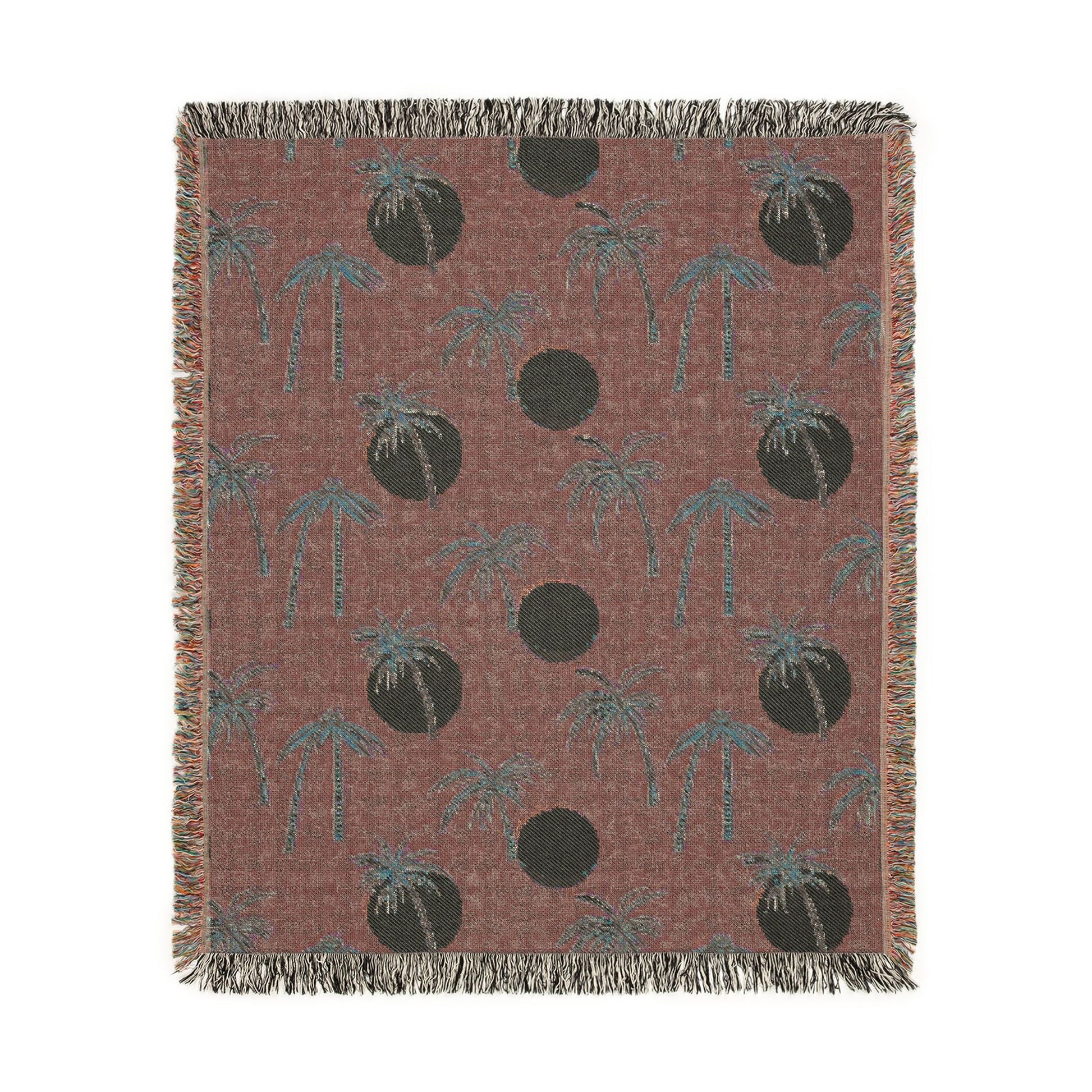 Reverse side of the Summer Palm woven blanket in rust with cream dots