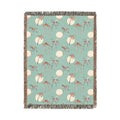 Summer palm woven blanket with tropical palm leaves, shown flat
